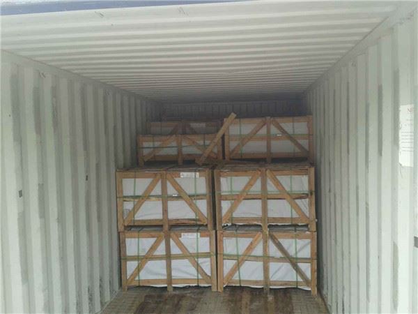 Beige travertine tiles container loading