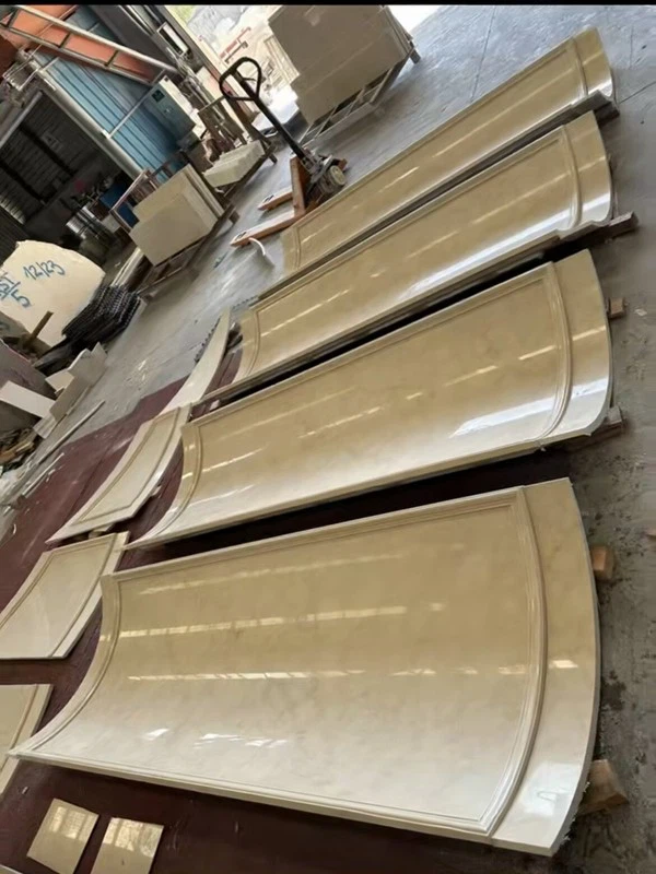 curved beige marble wall slabs